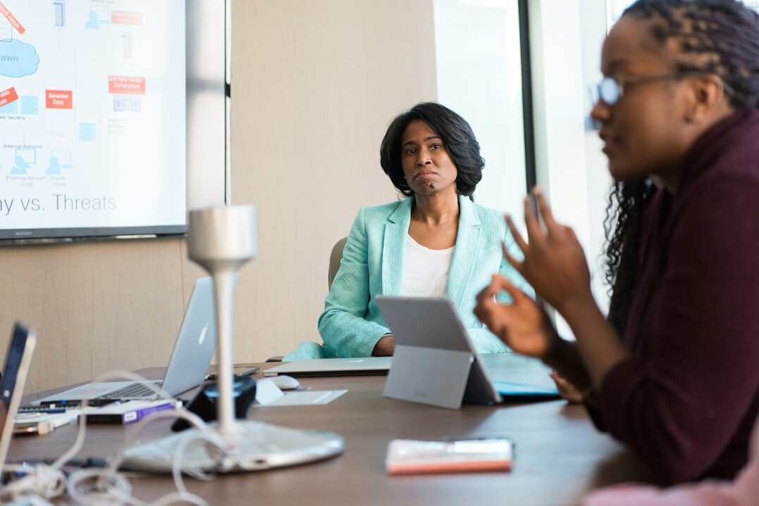 professional woman leading meeting