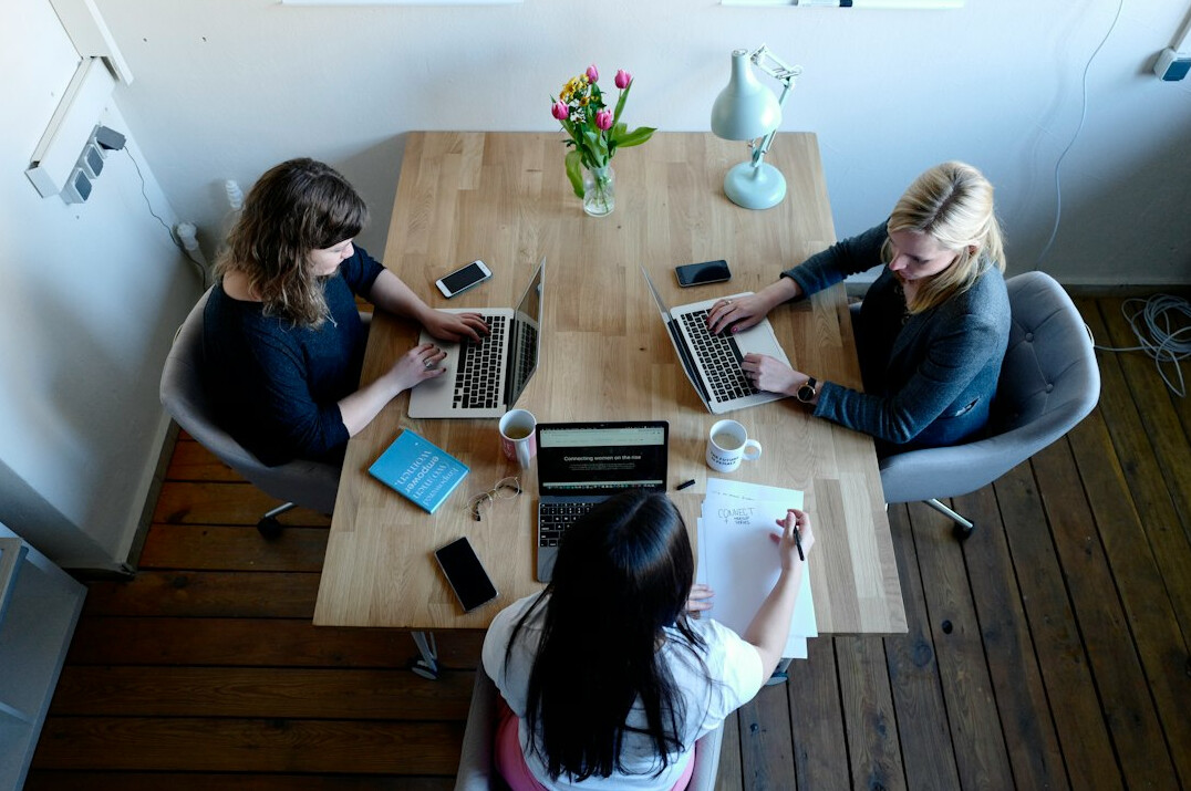 business people negotiating at table