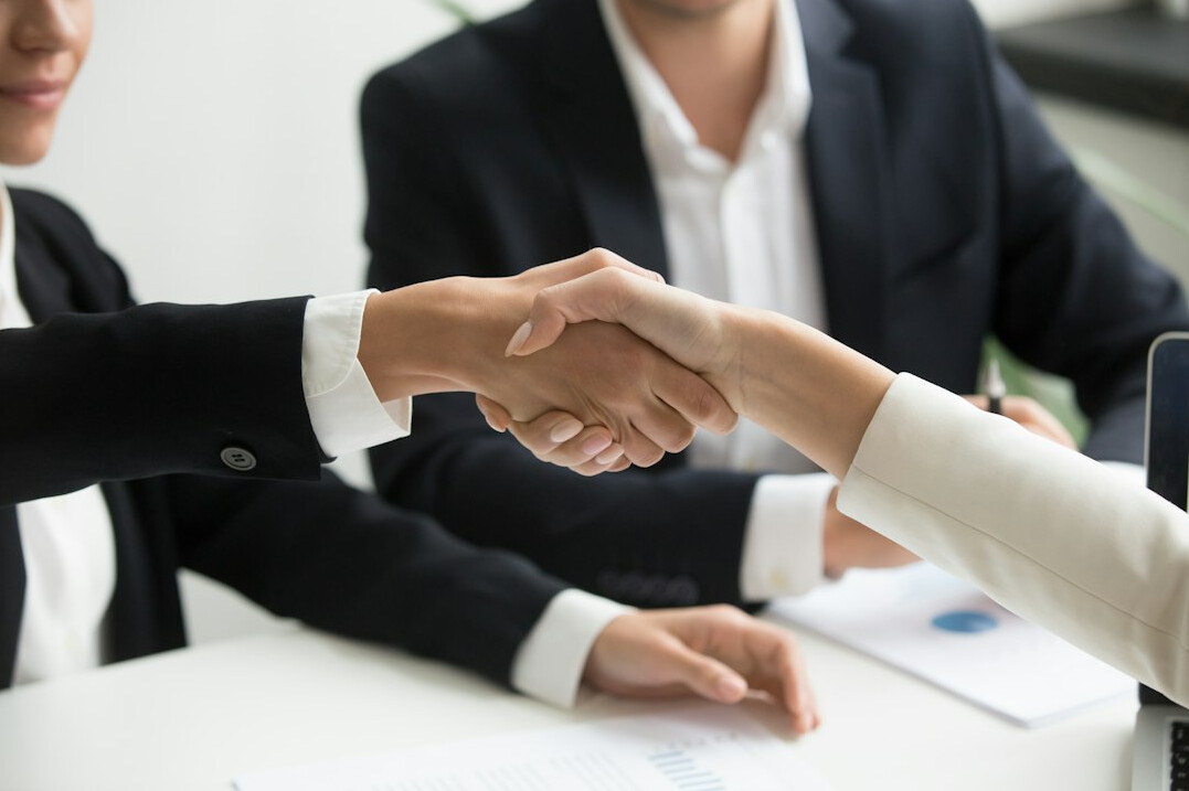 colleagues shaking hands