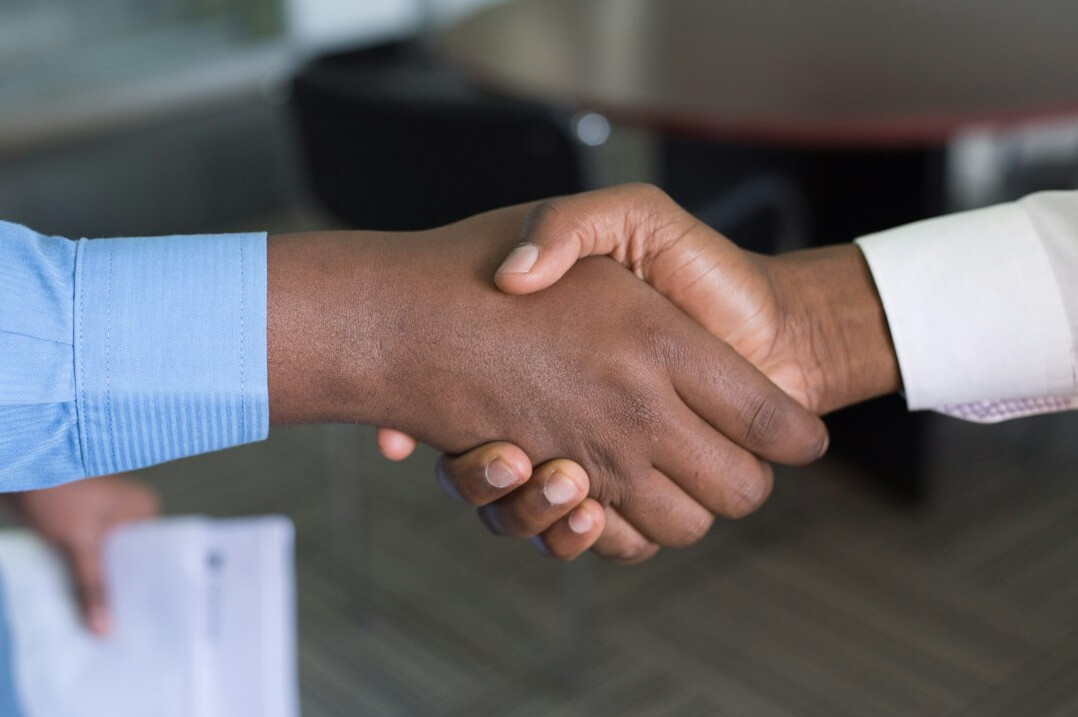 business handshake close up